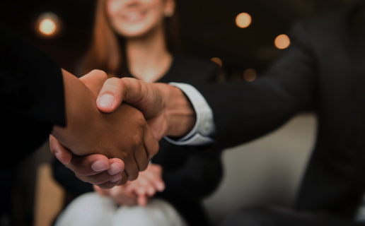 People shaking hands at the Alhambra Theatre